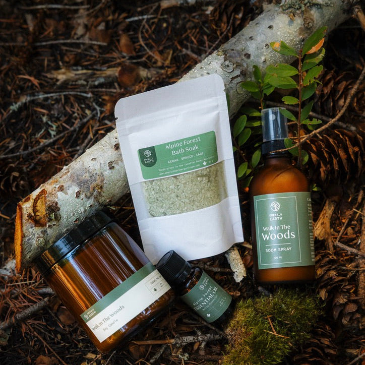 Cosmetic products with 'In the Woods' branding on a natural background