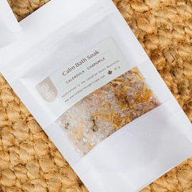 Bath soap bar with packaging on a woven surface