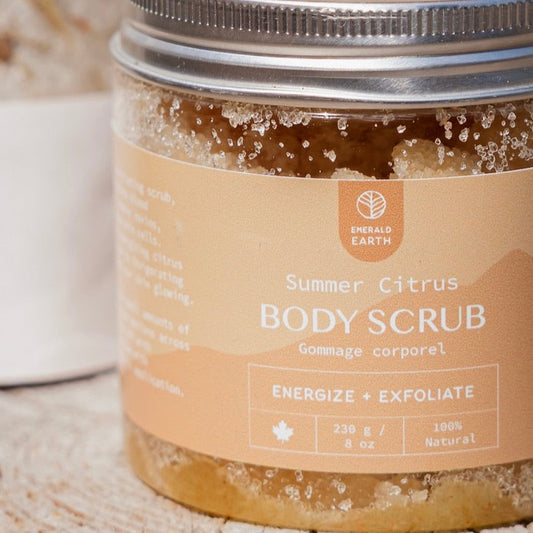 Jar of Summer Citrus body scrub with visible label on a neutral background