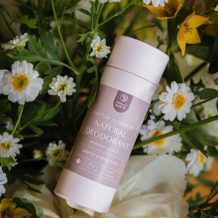 Deodorant stick on a bed of flowers